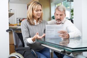 Couple looking over documents at a lawyer's office